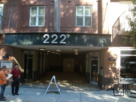 Brad Hudson ( in orange ) showing 222 Glenwood.